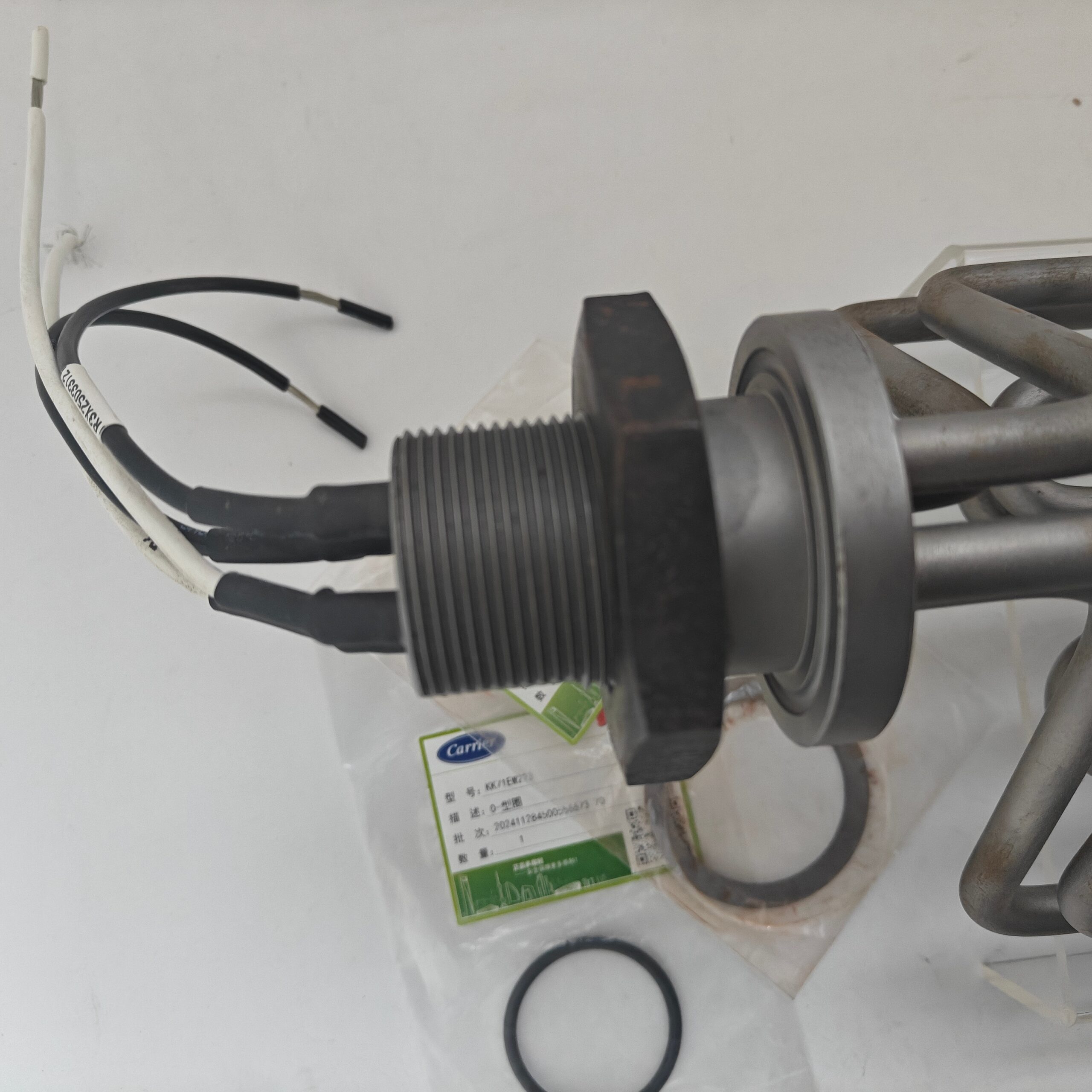 Carrier 02XR05001501 electric heating element for 19XR centrifugal chiller crankcase oil heater; stainless steel construction.