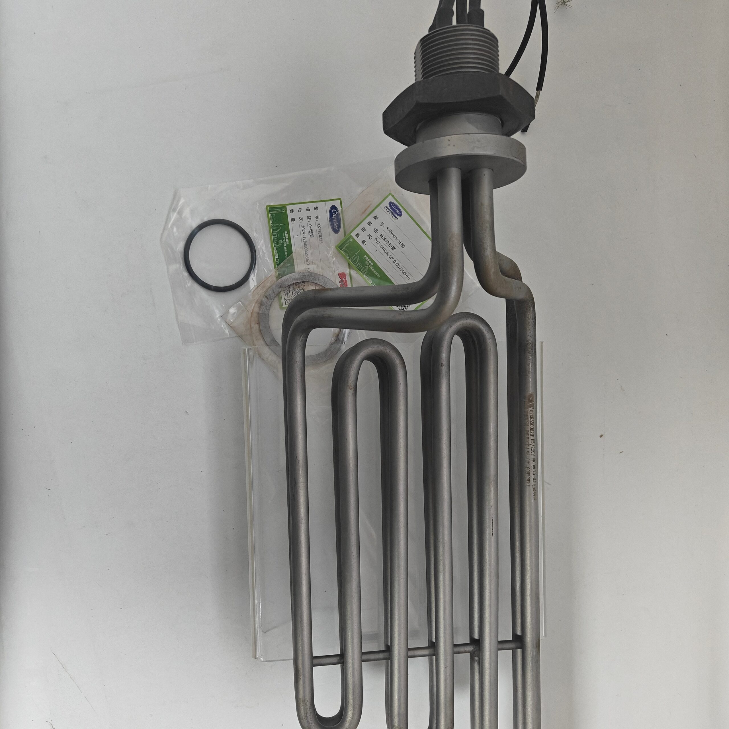 Carrier 02XR05001501 electric heating element for 19XR centrifugal chiller crankcase oil heater; stainless steel construction.
